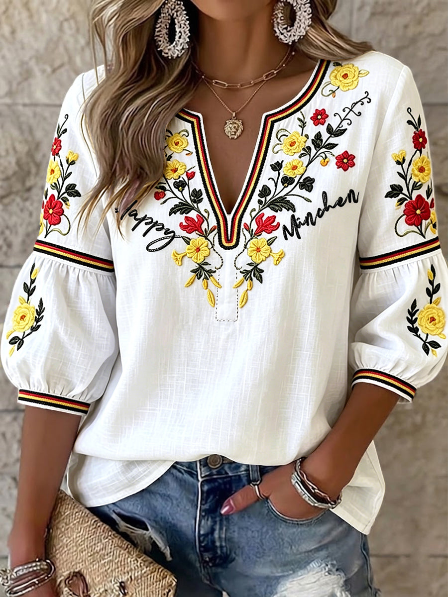Damenweißes Baumwoll-Leinen-T-Shirt mit München-Blumenmuster und V-Ausschnitt, lässig geschnitten