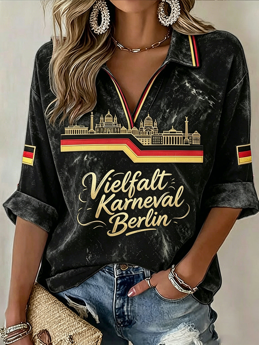 Damen-T-Shirt in Schwarz mit deutschem „Karneval der Kulturen“-Print, lässig, mit V-Ausschnitt