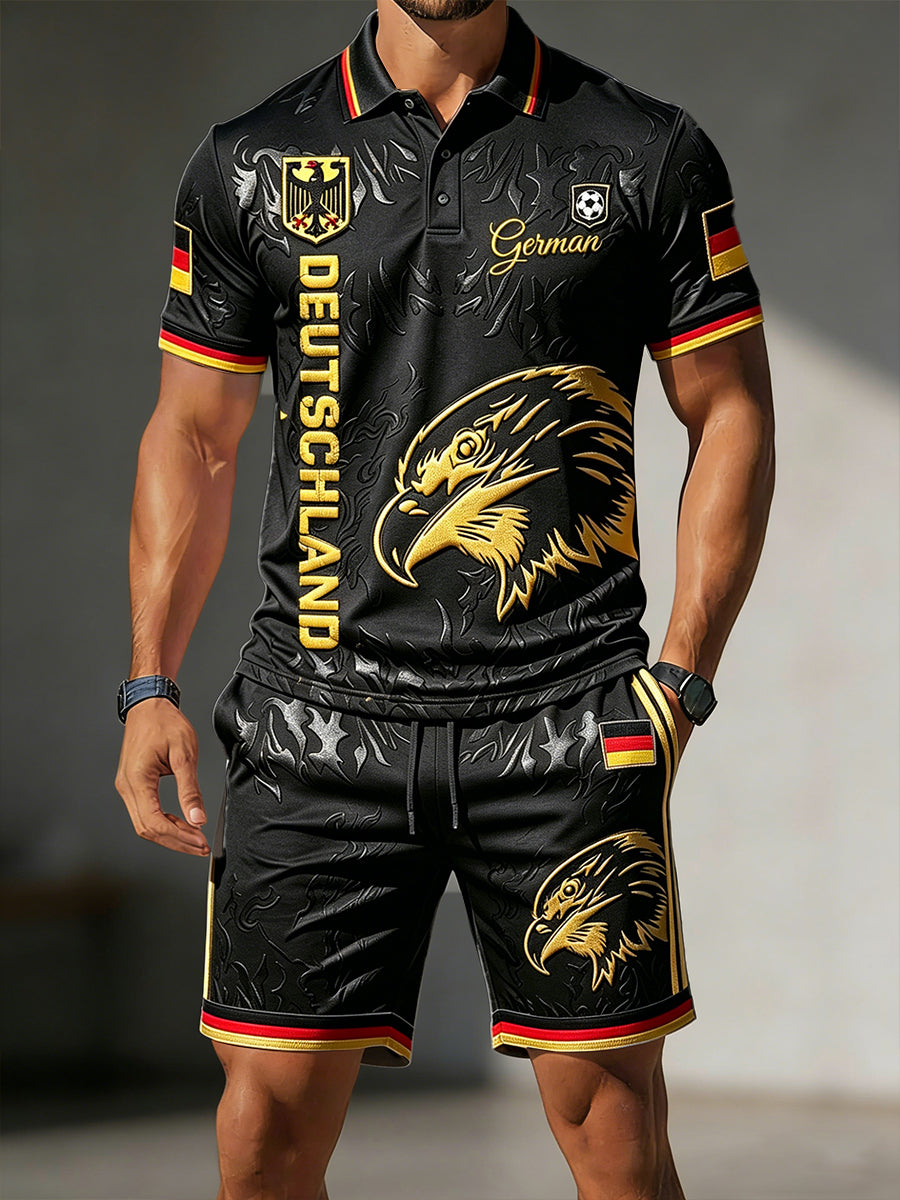Herren-Set bestehend aus schwarzer Freizeit-Poloshirt mit deutschem Fußballmotiv und Shorts